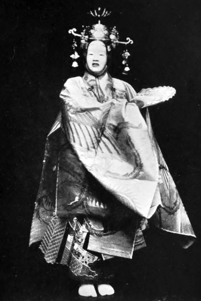 A celestial maiden dances in her feather mantle above the pine shore of Miho.